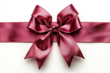 Close-up of red ribbon with bow