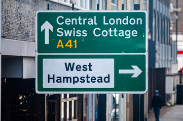 Transportation in London city, roads, road signes, street signes, warnings, indicating of directions in Great Britain, city life in England