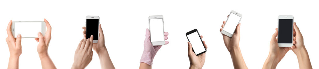 Set of hands with smartphones on white background