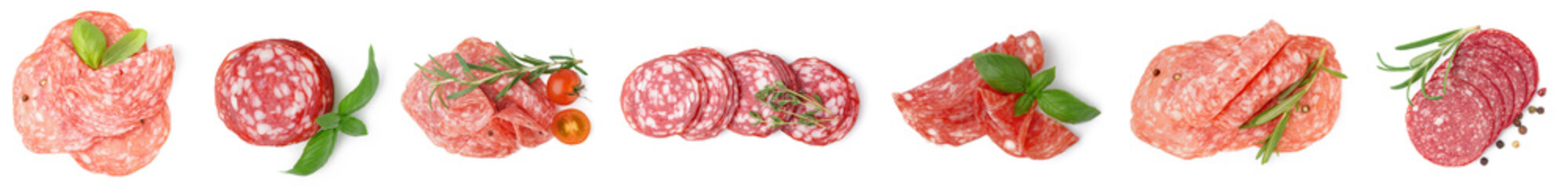 Set of tasty sliced salami on white background, top view
