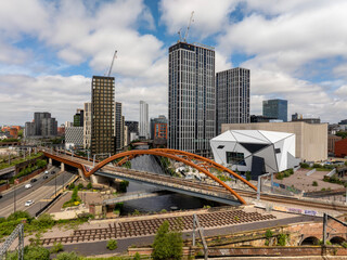 city skyline with railway bridge