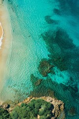 Obraz premium an aerial view of a beach and ocean 