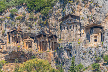 Grandiose Caunos Tombs of the Kings, Turkey - Majestic Rock-Cut Ancient Graves Amidst Lush Greenery