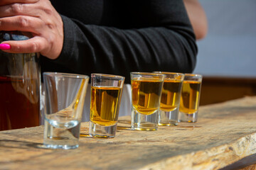 whiskey in glass on a wooden table top stacks