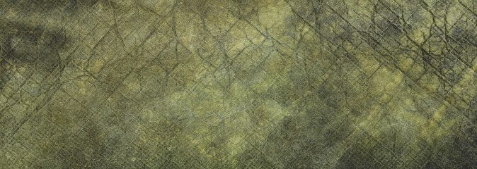 old dirty crumpled green leather background