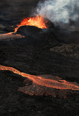 Volcanic eruption in Iceland. Flowing hot lava from the crater.