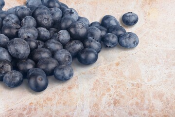 ripe sweet tasty blueberry on the desk