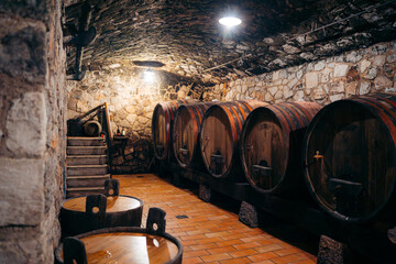 wine barrels in cellar