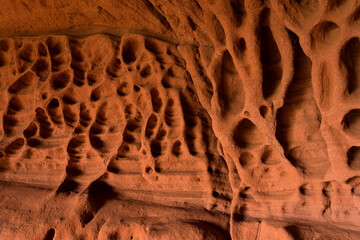 Red sandstones formations into the Foradada cave in the Areny mountain in Mont-Roig, Tarragona,...