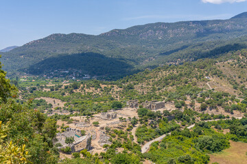 Aerial View of Ancient Kaunos Ruins from Acropolis, Turkey - Lush Green Valleys and Historical Landmarks