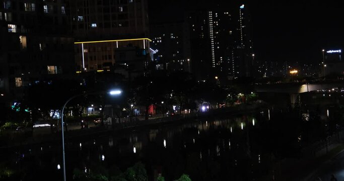 Night motorcycles in Ho Chi Minh City. Crowded Touristic Area with night life in Saigon, Vietnam.
