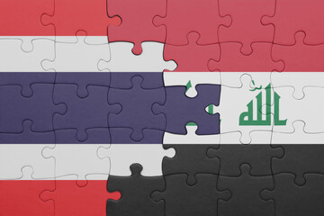 puzzle with the colourful national flag of thailand and flag of iraq .