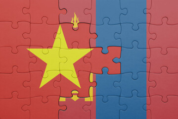 puzzle with the colourful national flag of vietnam and flag of mongolia .