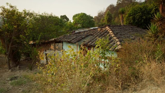 View of the roof of a humble house on the outskirts of the city in America.