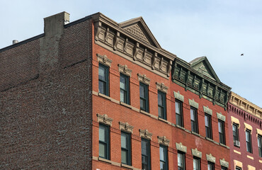 jersey city brownstone building detail (historic pre-war red brick buildings with power lines)...