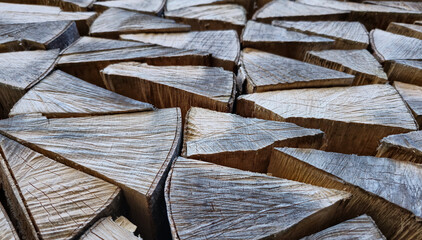 Stack of raw chopped forest wood for the oven