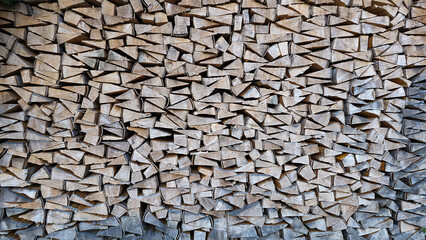 Stack of raw chopped forest wood for the oven