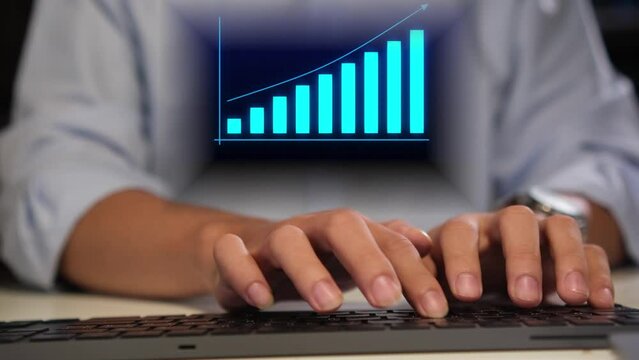 Hombre de negocios tipeando en su laptop. Gr&aacute;fico de barras mostrando crecimiento, rentabilidad, &eacute;xito, l&iacute;nea de tendencia.