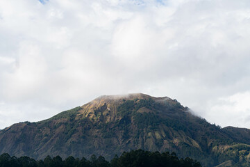 Mountain landscape with house and agricultural fields