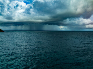 Fototapeta premium Aerial view of Storm clouds over sea,Sea surface ocean waves background