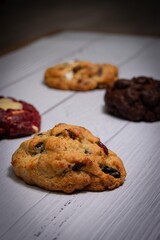 NY Style homemade cookies assorted flavors on white wood table