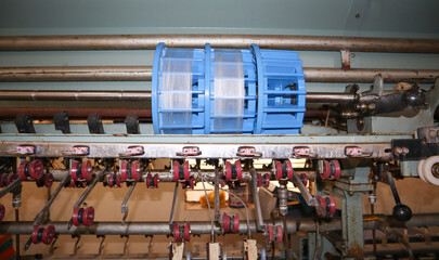 An Overview of a Machinery used for extracting silk threads on the spools in sericulture farming at...