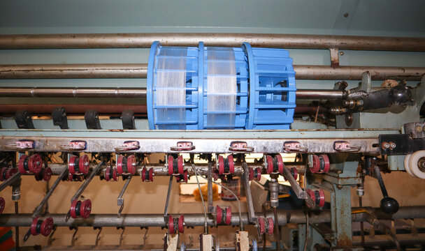 An Overview of a Machinery used for extracting silk threads on the spools in sericulture farming at Mysore city, India.