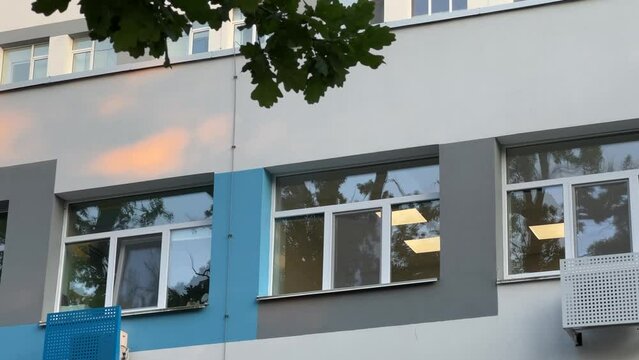 Contemporary Clinic Facade. Sunset Over Modern Hospital Design