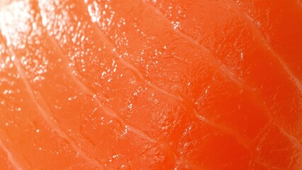 Elevate your palate: Impeccable salmon sashimi boasting a rich, deep orange hue and fine marbling. The glossy texture ensures a decadent, melt-in-your-mouth experience, redefining culinary elegance.
