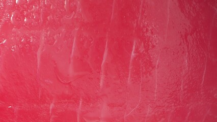 Behold the stunning close-up of a slice of fresh tuna, its vivid redness and supple texture...
