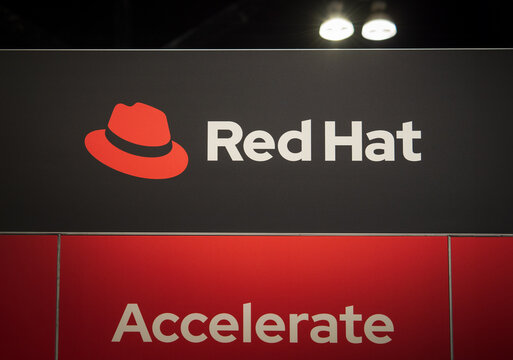 LOS ANGELES, CA- May 22, 2024: Red Hat logo on Red Hat booth at AWS Summit in Los Angeles Convention Center