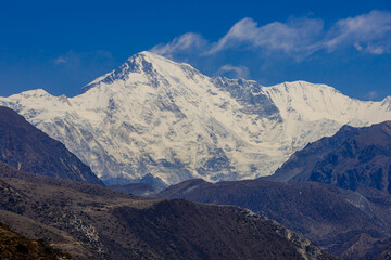 Himalaya mountains landscape with high altitude snow and ice glacier summit peaks. Everest Base Camp Solo Khumbu trekking region in Nepal. Beautiful Himalayas eight thouthander summits under blue sky