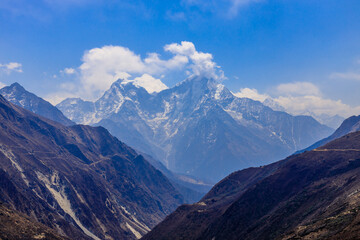 Himalaya mountains landscape with high altitude snow and ice glacier summit peaks. Everest Base Camp Solo Khumbu trekking region in Nepal. Beautiful Himalayas eight thouthander summits under blue sky
