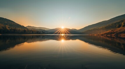 Fototapeta premium The sun rising over a tranquil mountain lake, casting a warm glow over the mirrored surface of the water
