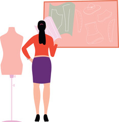 A girl is looking at a sketch of clothes.