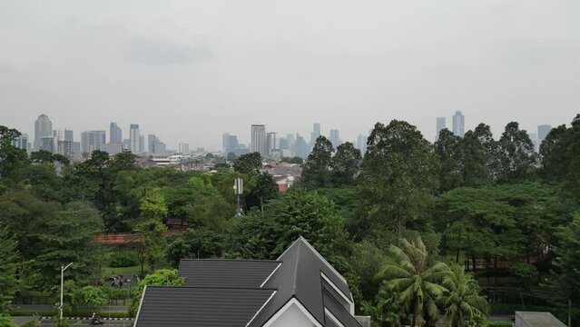 Aerial view of Tebet Eco Park from a residential area in Jakarta, Indonesia.