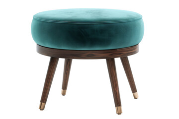 A blue velvet ottoman with wooden legs sits on a white background