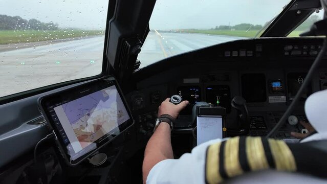 Taking off from a runway in a rainy day. European Captain side immersive view. Santander airport, Spain. Clouded sky. 4K 60FPS