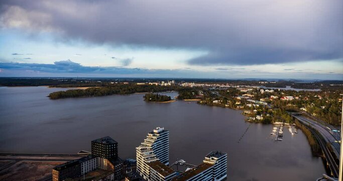 Timelapse of clouds moving and a rainbow above the Kulosaari island in Helsinki