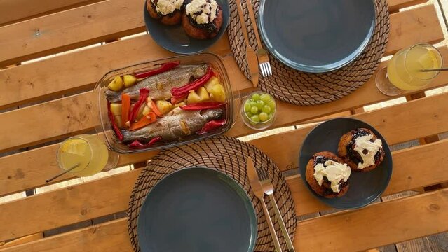 Traditional romanian fish dish and papanas