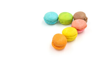 Sweet colorful macarons isolated on white background. Tasty colourful macaroons.