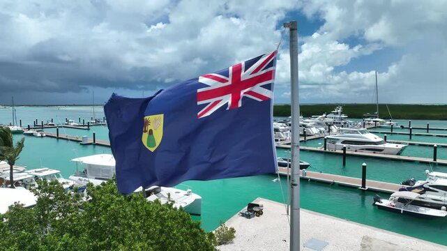 Turks and Caicos Flag Fluttering at Leeward Marina