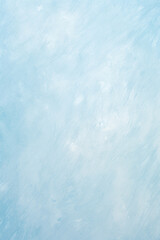 Obraz premium Light blue pastel textured background with soft brush strokes, perfect for design and creative projects.