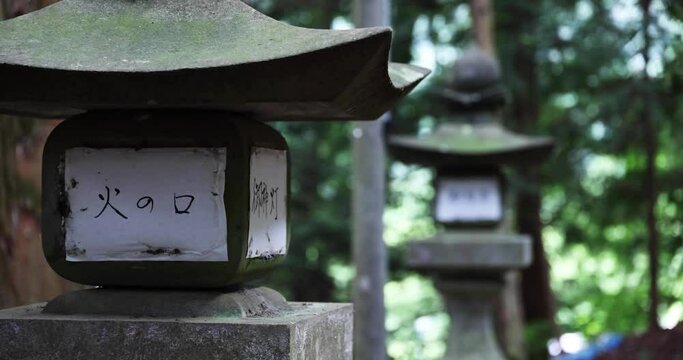 Old Stone lanterns at Japanese old shrine at the countryside close up