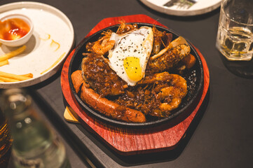 Mixed seafood contain grilled meat assortment with pepper & egg