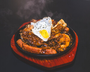 Mixed seafood contain grilled meat assortment with pepper & egg