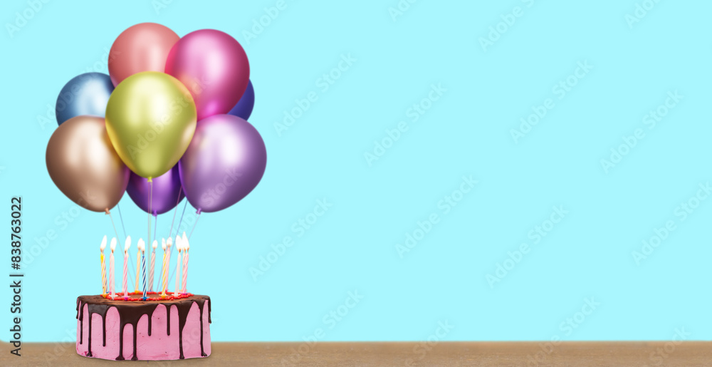 Poster Birthday cake with bunch of shiny colorful balloons on blue background. Empty space for text. 3d rendering