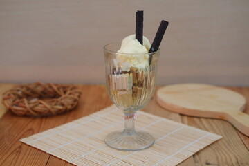 Glass filled with ice cream and wafer