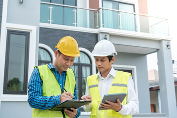 inspector engineer and owner project is inspecting construction and quality assurance new house. Engineers or architects or contactor work to build the house before handing it over to the homeowner