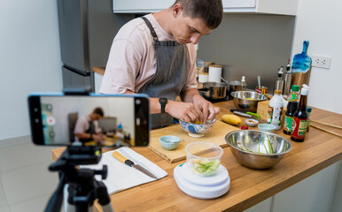 The chef is broadcasting live from workshop how to prepare a vegetarian food